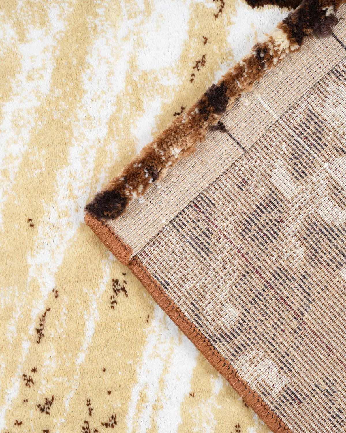 Cosmo Ivory and Brown Carpet