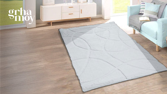 Warm Up Your Bedroom with Cozy Throws and Furry Rugs